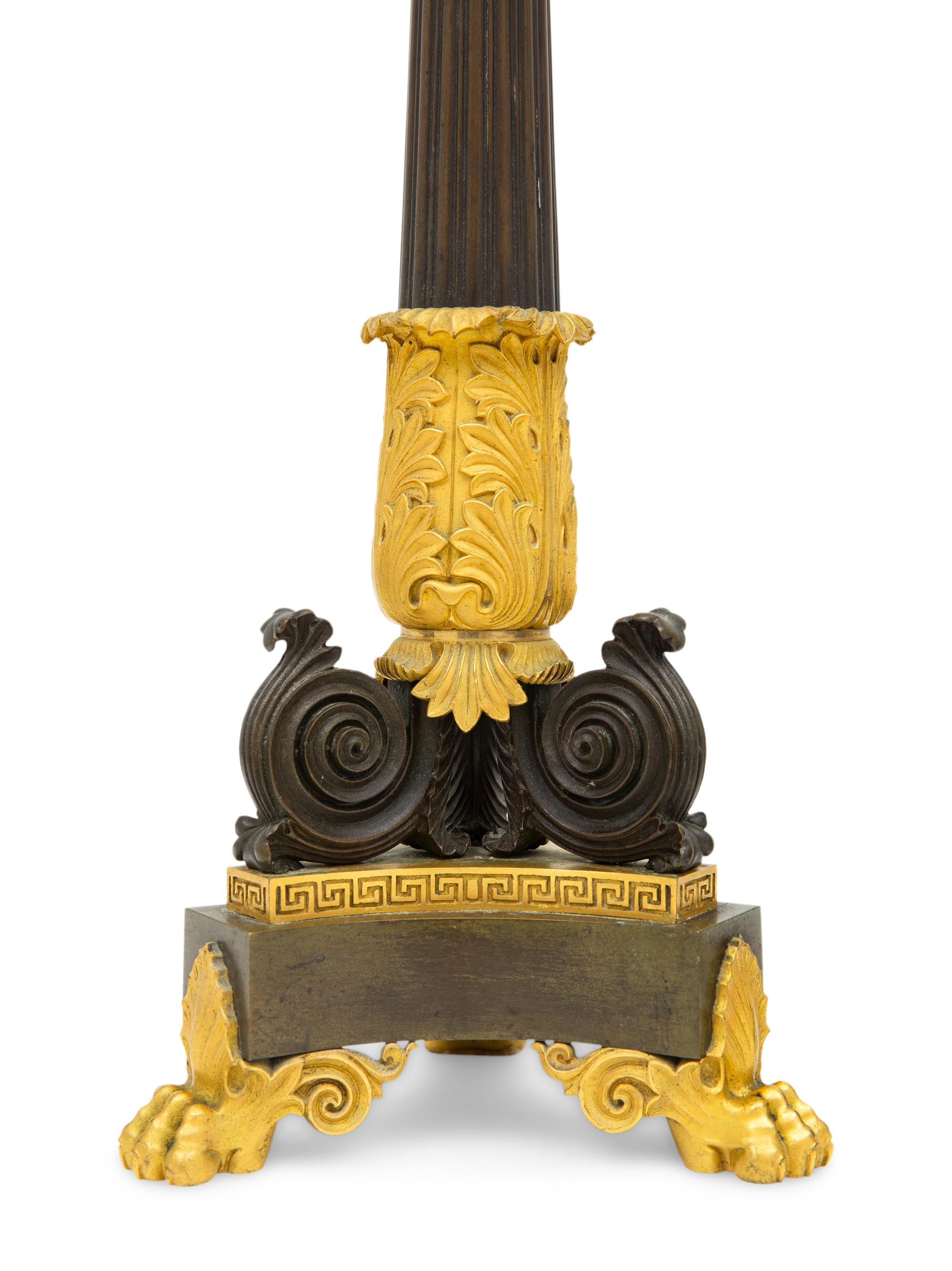 A Pair of Charles X Gilt and Patinated Bronze Seven-Light Candelabra