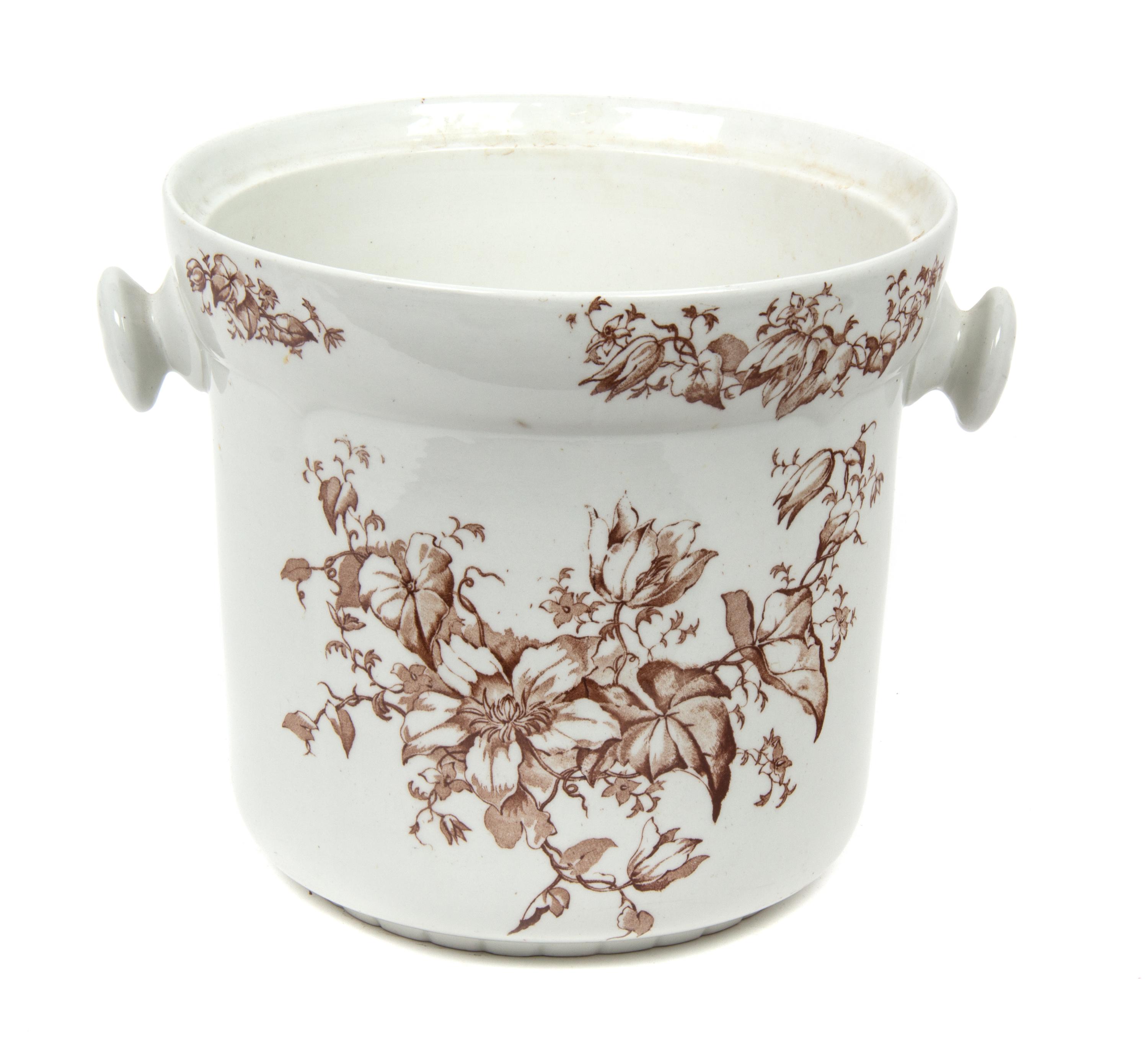 An English Transfer Decorated Ceramic Jardiniere Height 9 1/2 inches. — 19TH CENTURY
