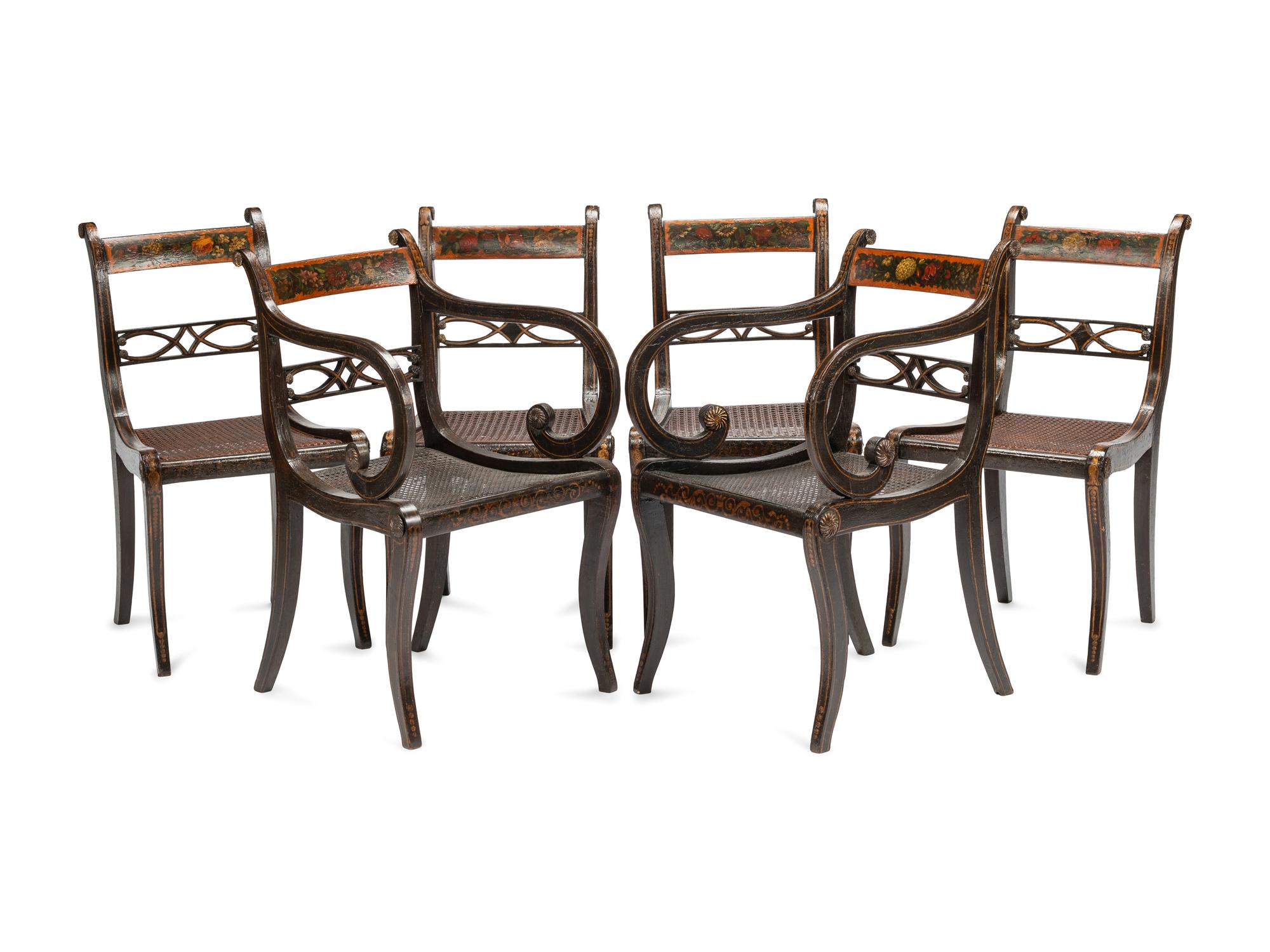 A Set of Six Regency Stencil Decorated and Parcel Gilt Ebonized Dining Chairs