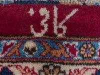 A Kashan Wool Rug