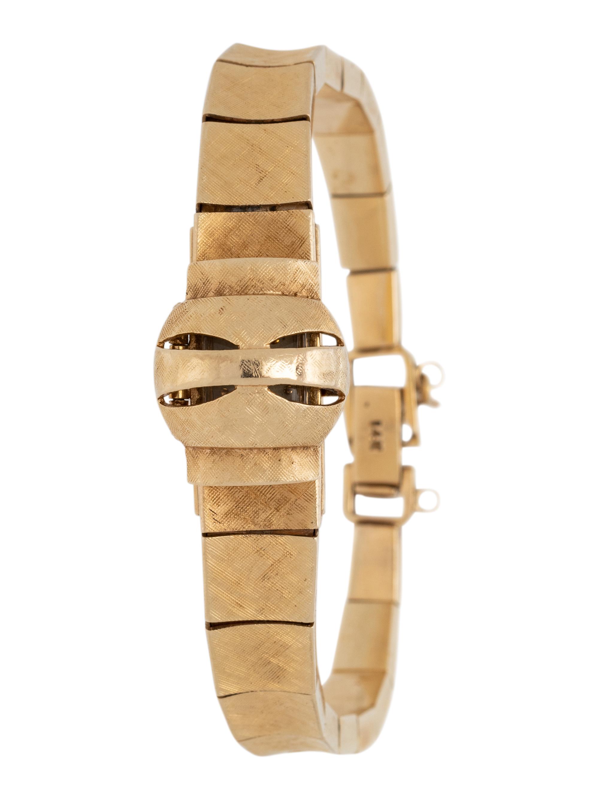 CROTON, 14K YELLOW GOLD SURPRISE WRISTWATCH