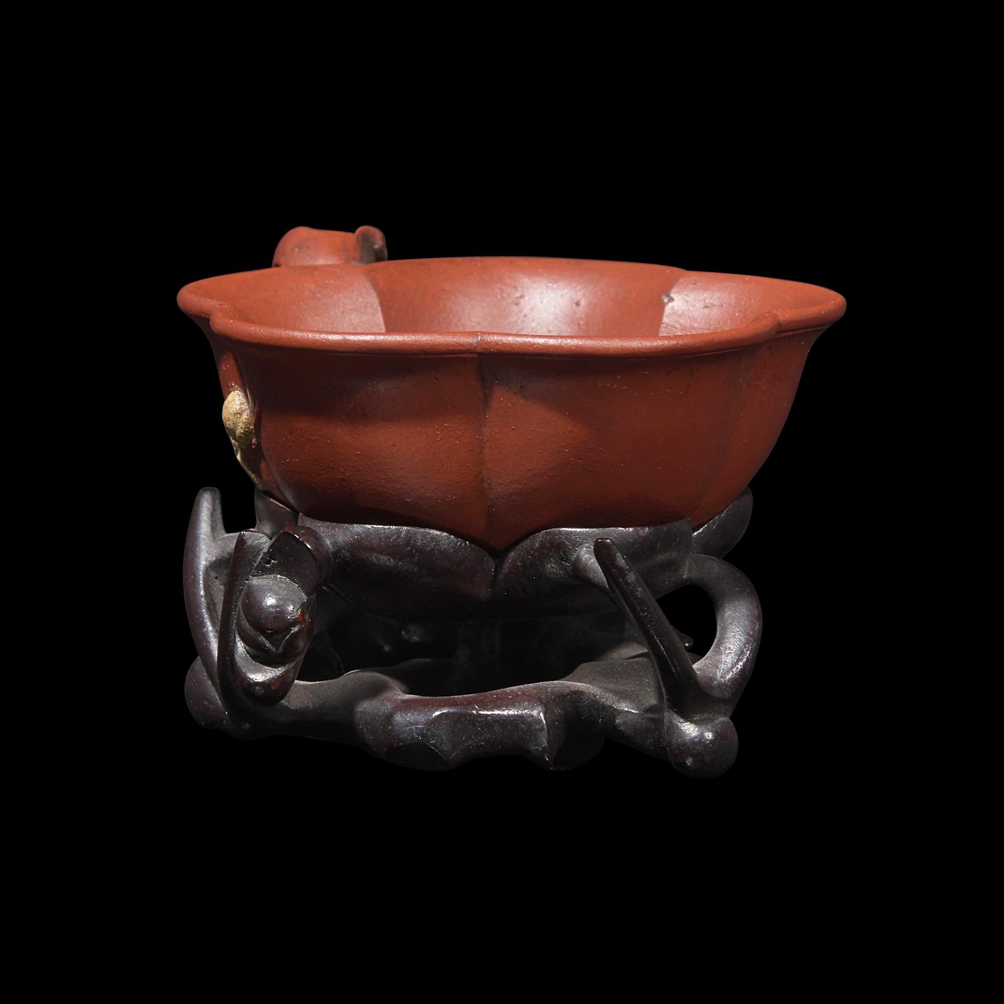 A Rare Yixing 'Prunus Blossom' Coupe with Impressed Seal 'Mingyuan', and Wood Stand 陳鳴遠款朱泥紫砂梅花杯