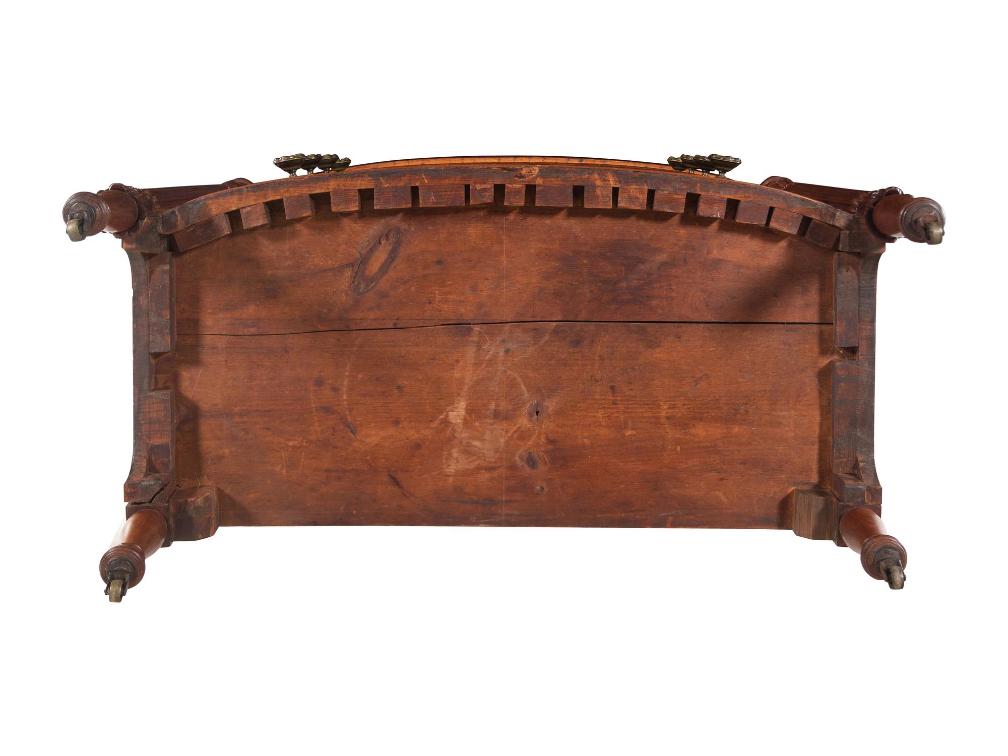 A Federal Carved and Figured Mahogany Bow-Front Chest of Drawers