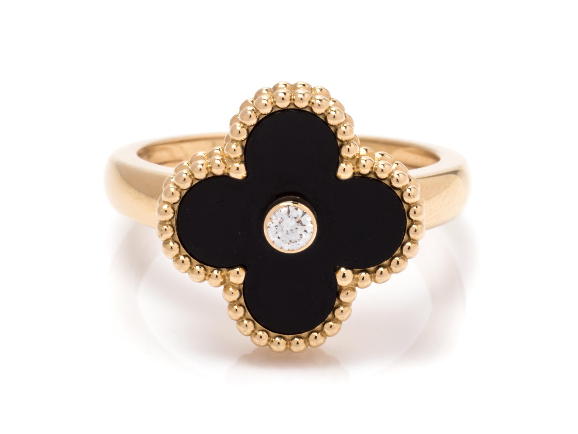 An 18 Karat Yellow Gold, Onyx and Diamond 'Alhambra' Ring, Van Cleef & Arpels,