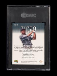 A 2001 Upper Deck SP Authentic Tiger Woods Tour Swatch TW-TS Rookie Golf Card (SGC 8.5 NM-MT+)
