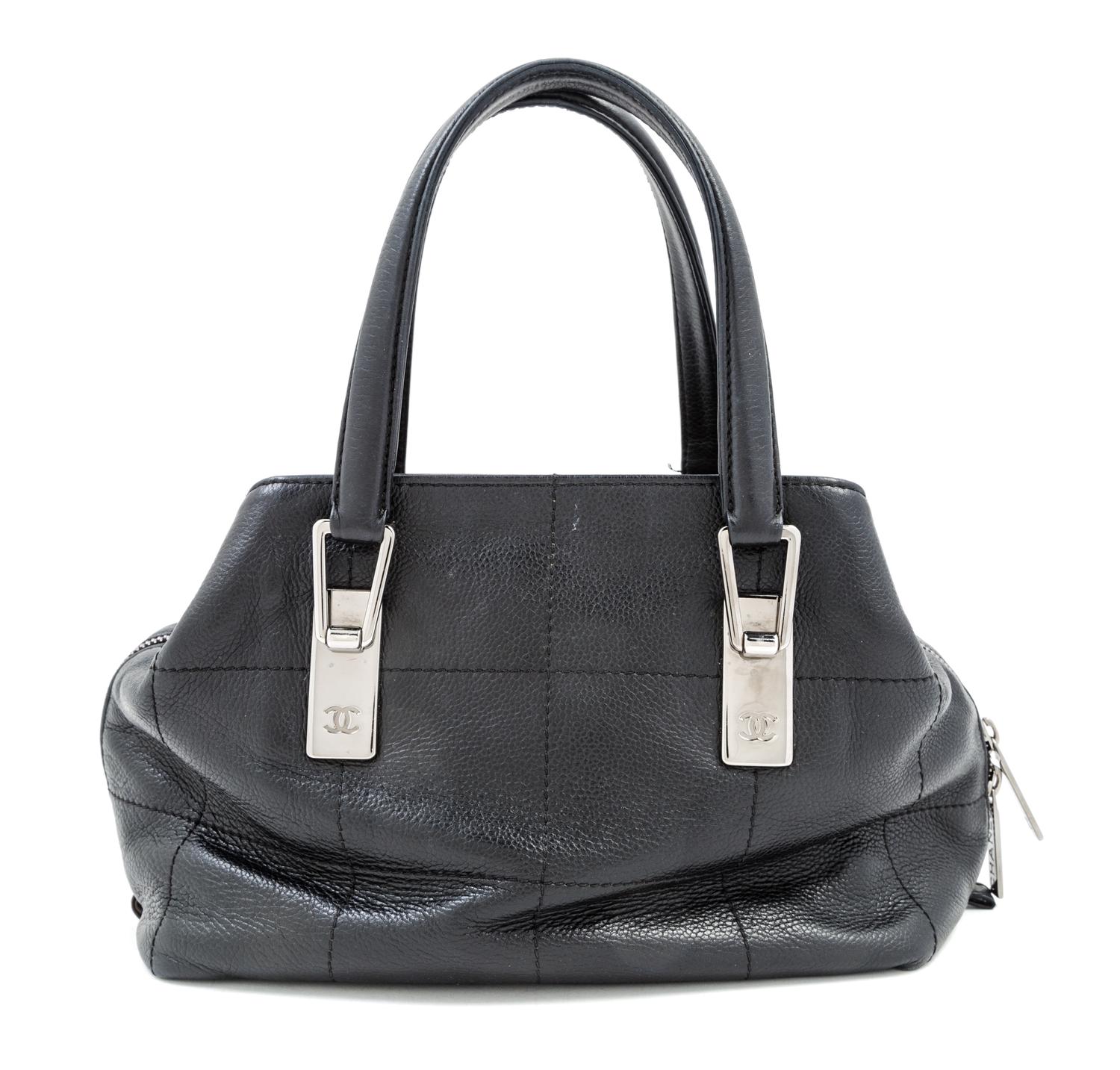 A Chanel Black Leather Handbag, 9.5" x 7" 5"; Handle drop: 5.5".