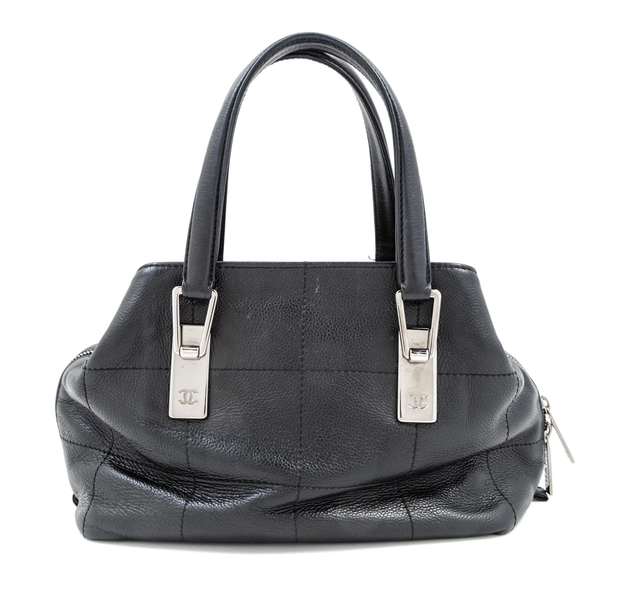 A Chanel Black Leather Handbag, 9.5" x 7" 5"; Handle drop: 5.5".