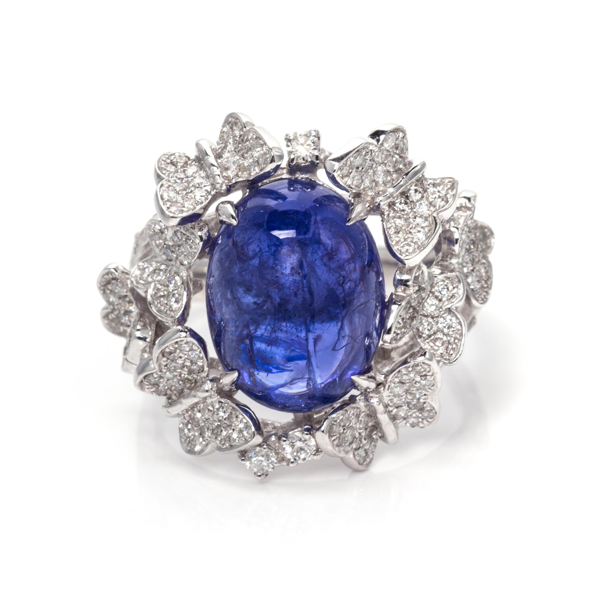 An 18 Karat White Gold, Tanzanite and Diamond Butterfly Motif Ring, 7.70 dwts.