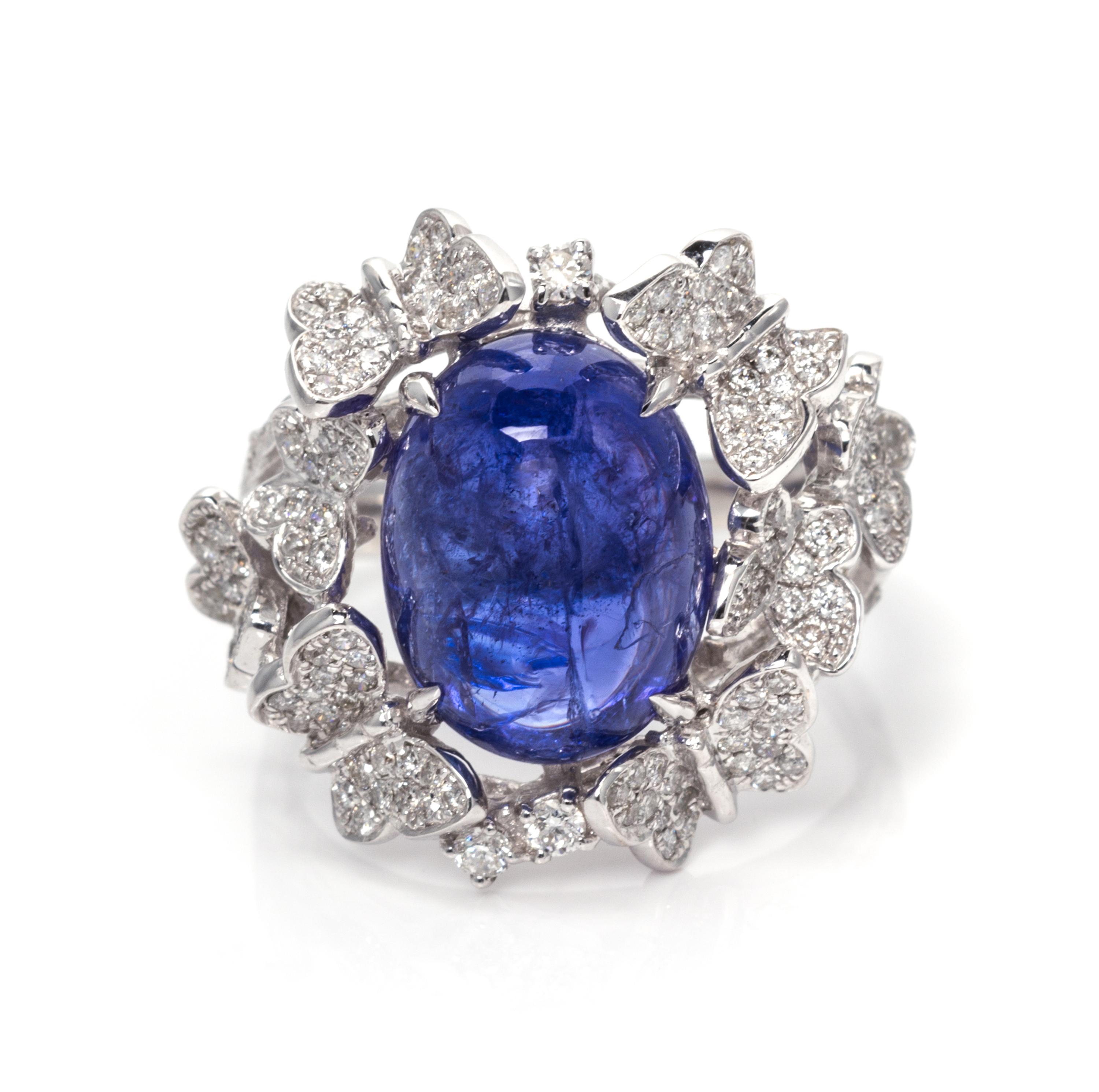An 18 Karat White Gold, Tanzanite and Diamond Butterfly Motif Ring, 7.70 dwts.