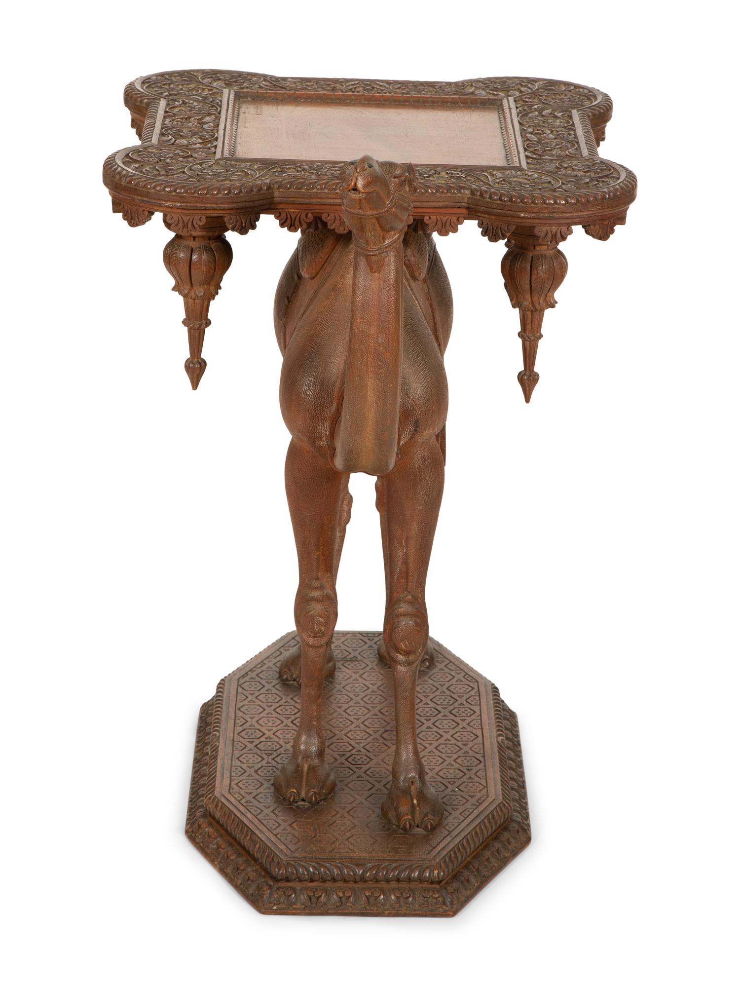 A Middle Eastern Carved Oak Camel-Form Side Table