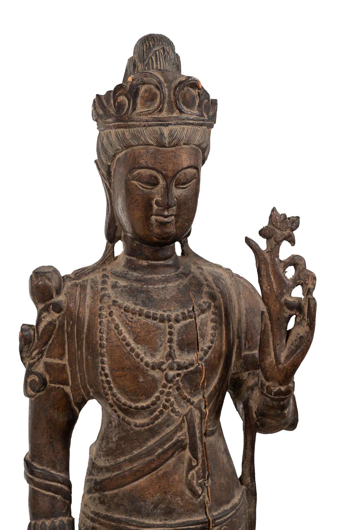 A Chinese Carved Wood Standing Guanyin Figure