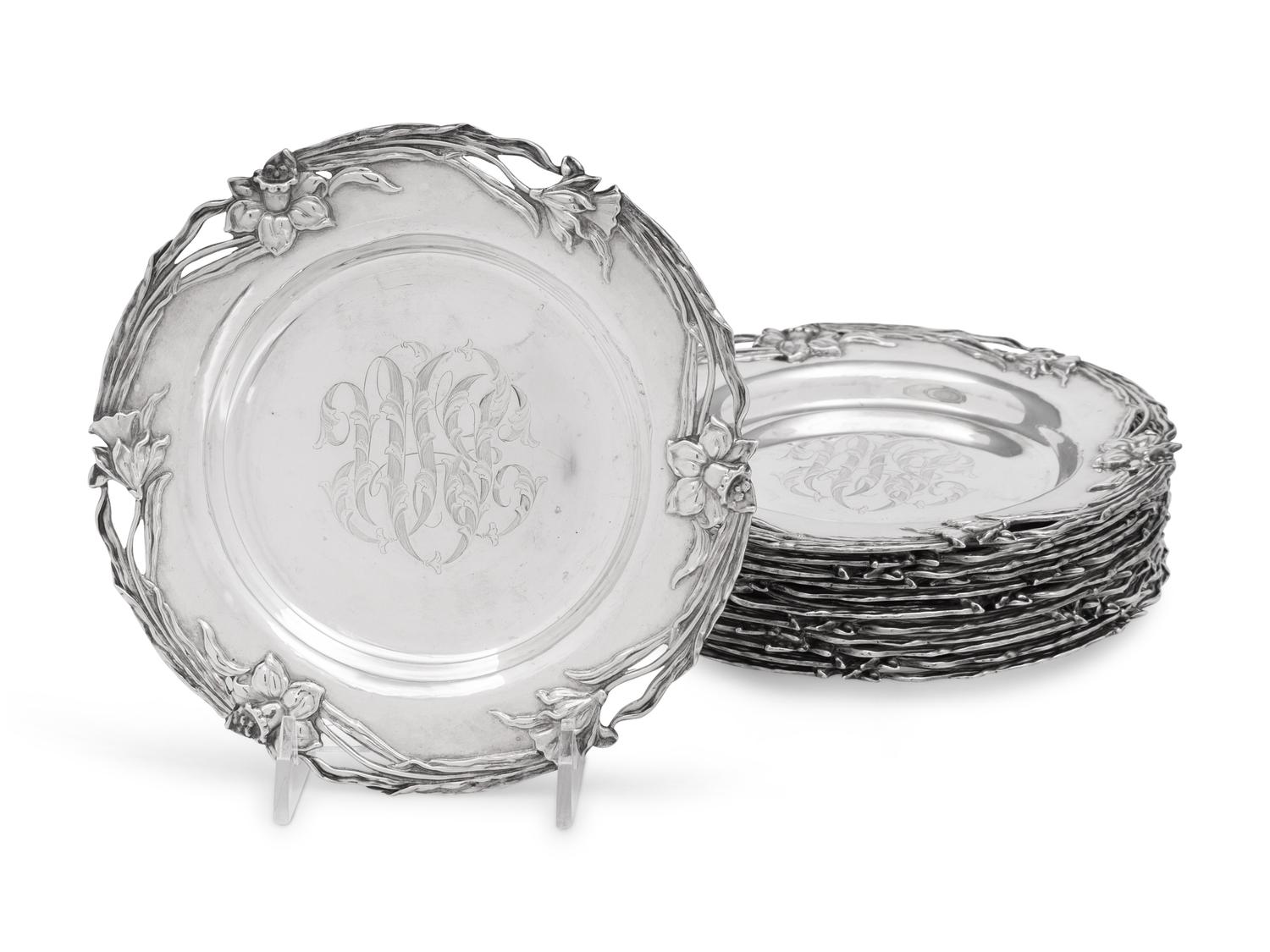 A Set of Twelve American Arts and Crafts Silver Bread Plates