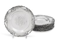 A Set of Twelve American Arts and Crafts Silver Bread Plates