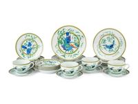 An Hermès Toucans Porcelain Dinner Service