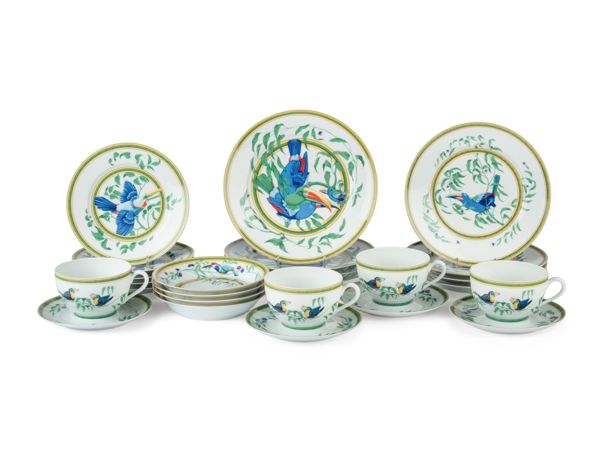 An Hermès Toucans Porcelain Dinner Service