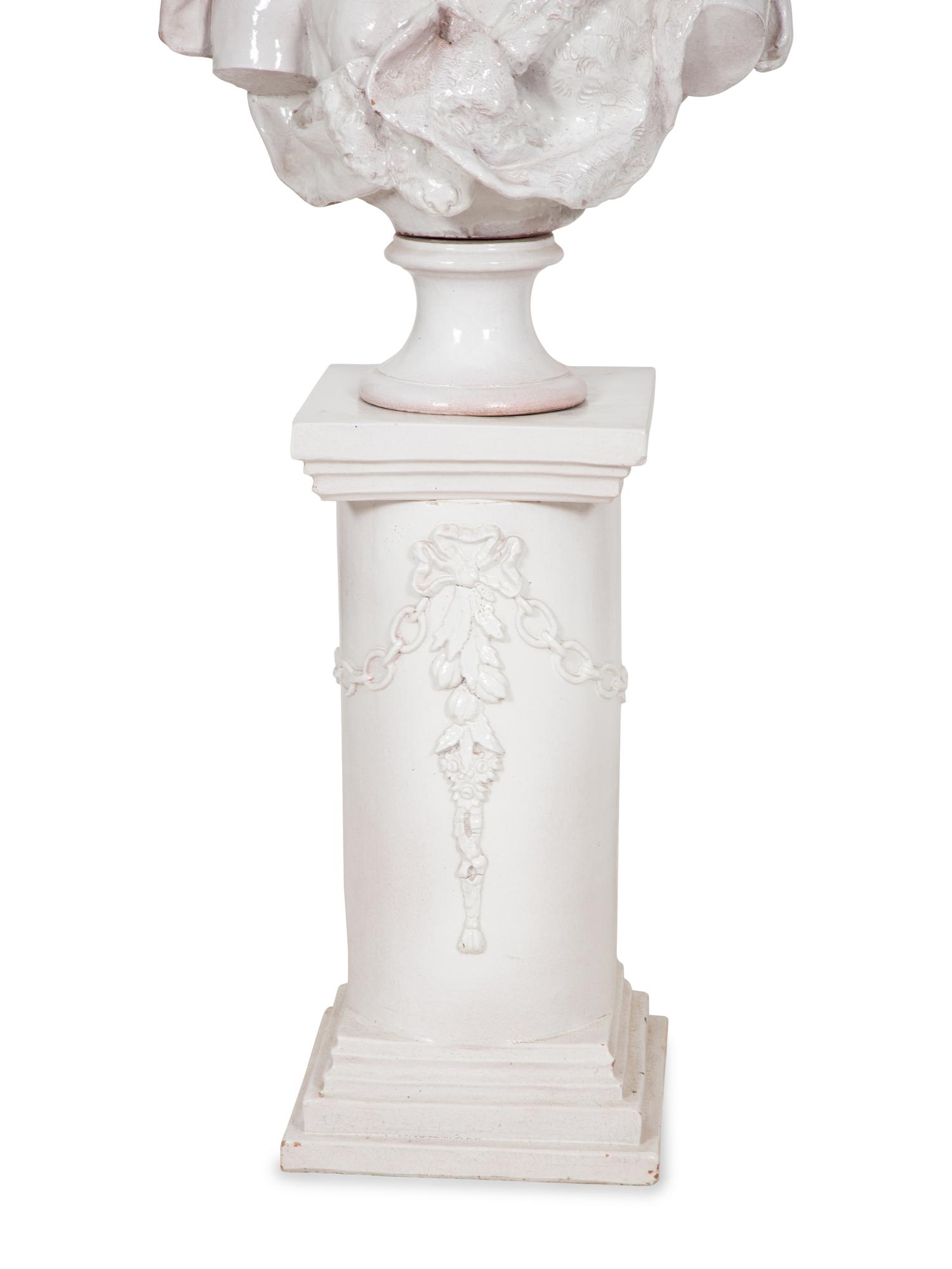 A Pair of Italian Glazed Terracotta Portrait Busts on Neoclassical Style Pedestals