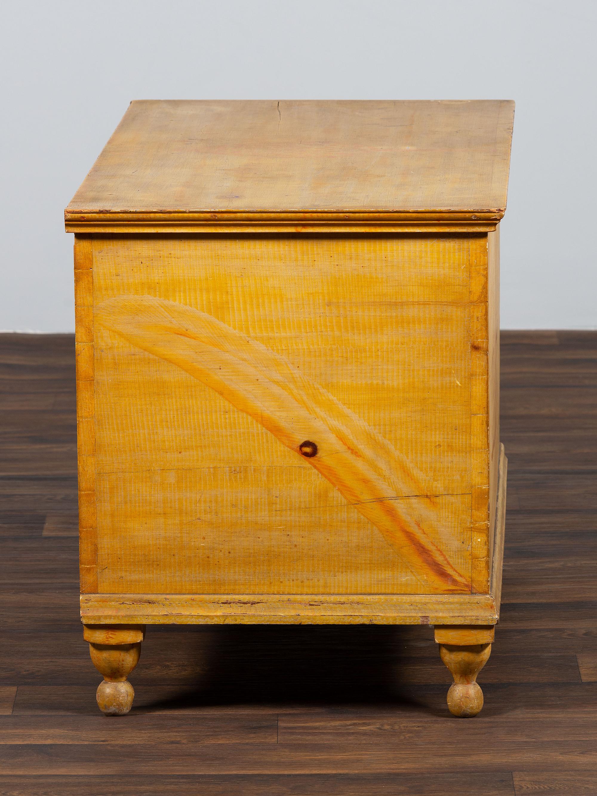 A Country Yellow and Red Paint Decorated Pine Blanket Chest