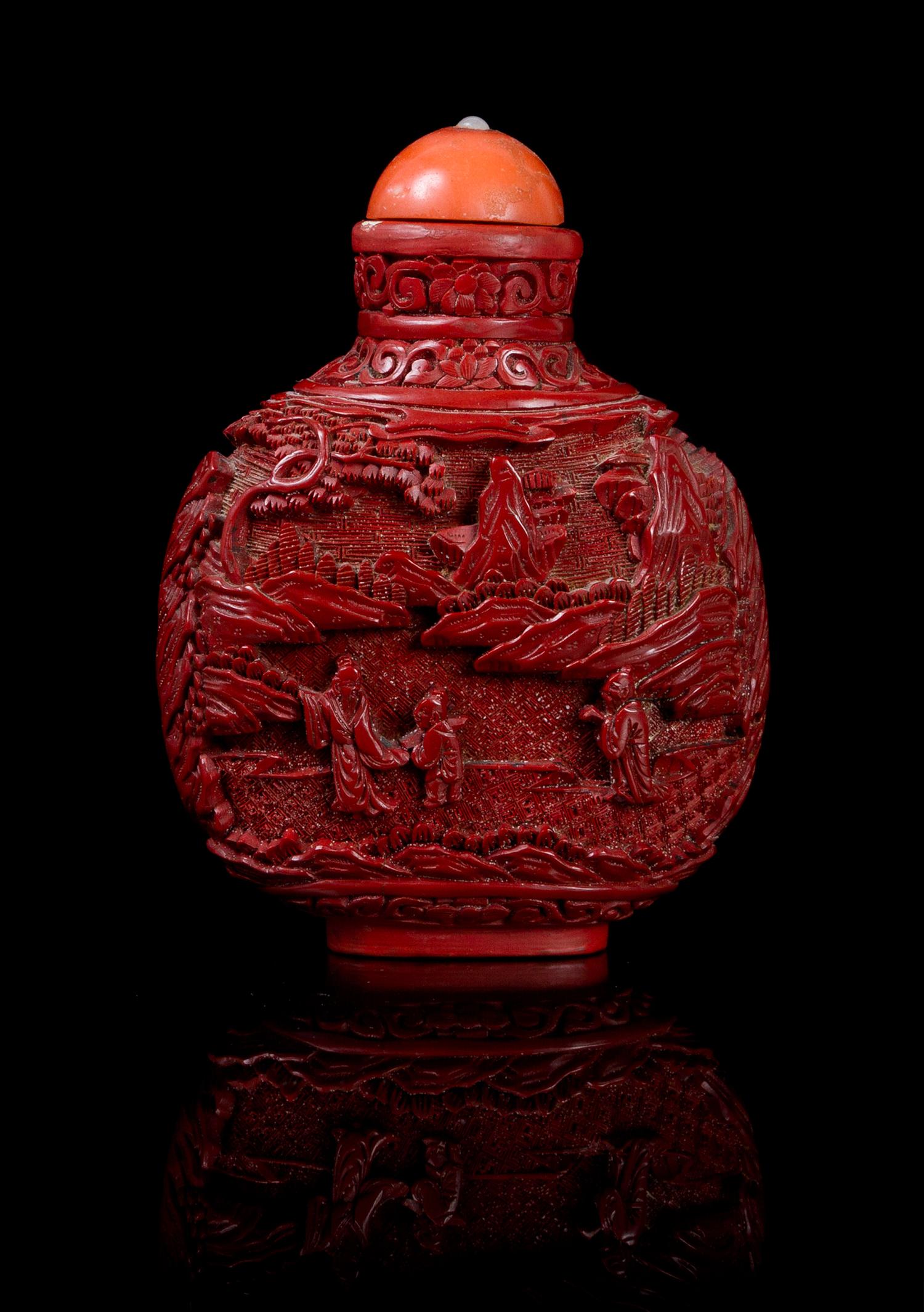 A Cinnabar Lacquer Snuff Bottle Height 3 1/2 inches.