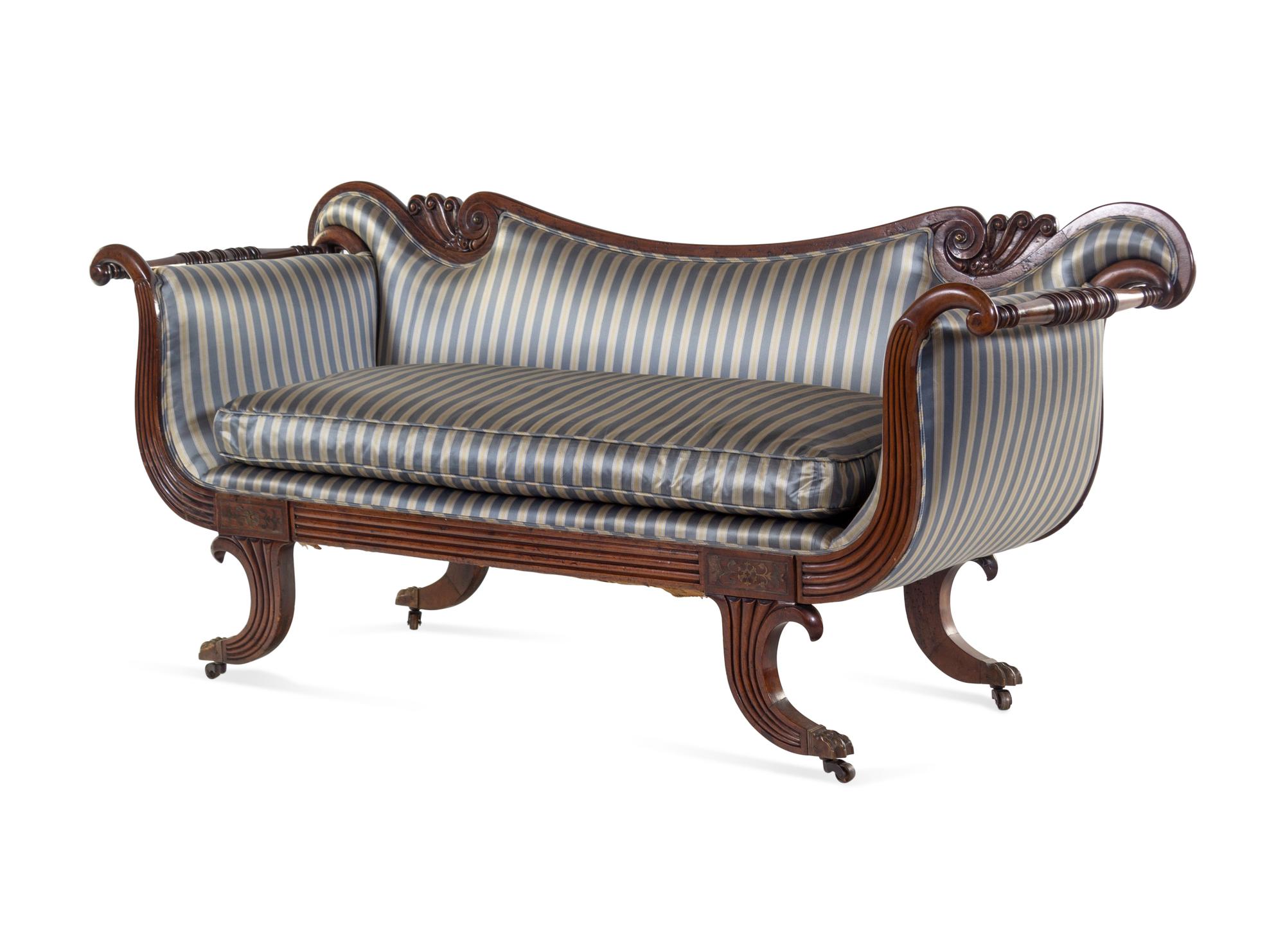 A George IV Brass Mounted Carved and Figured Mahogany Sofa