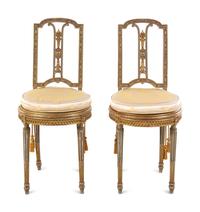 A Pair of Louis XVI Style Painted and Parcel Gilt Side Chairs