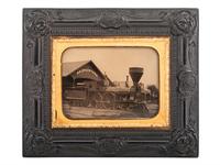 [EARLY PHOTOGRAPHY]. Quarter plate ambrotype of a train engine and tender at the South Braintree, Massachusetts, train station.