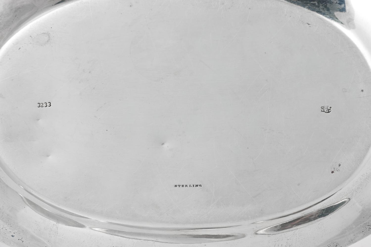 A Group of Four American Silver Platters