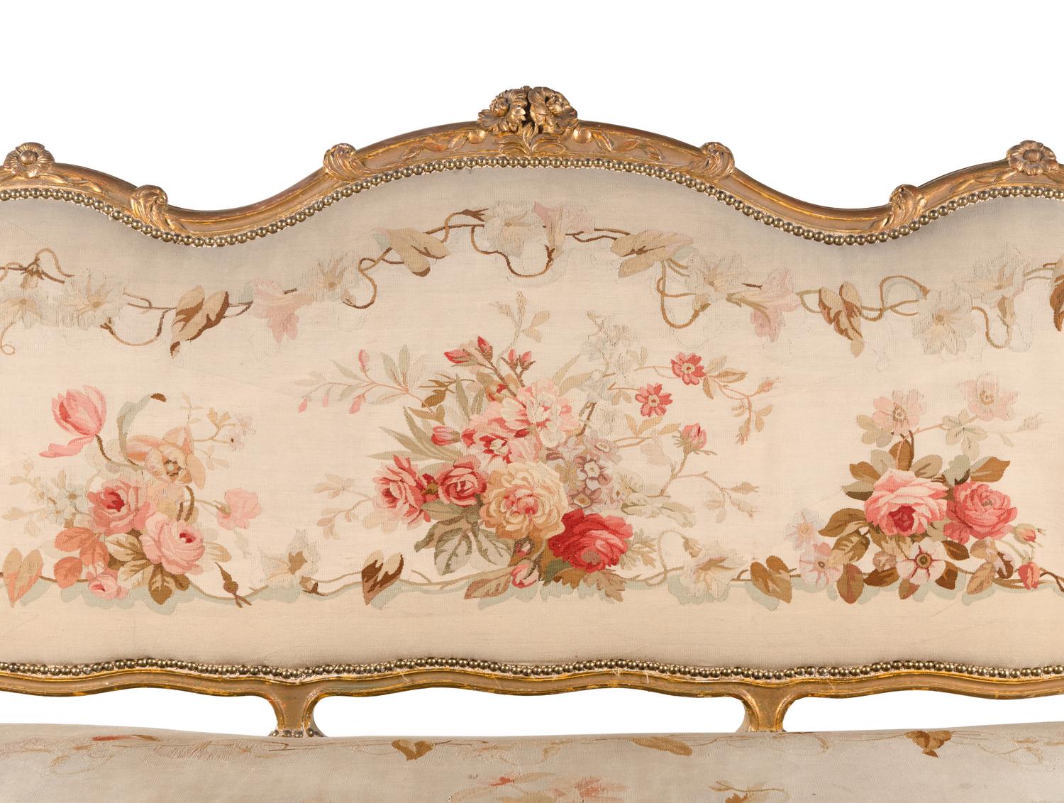 A Louis XV Style Giltwood Seven-Piece Salon Suite