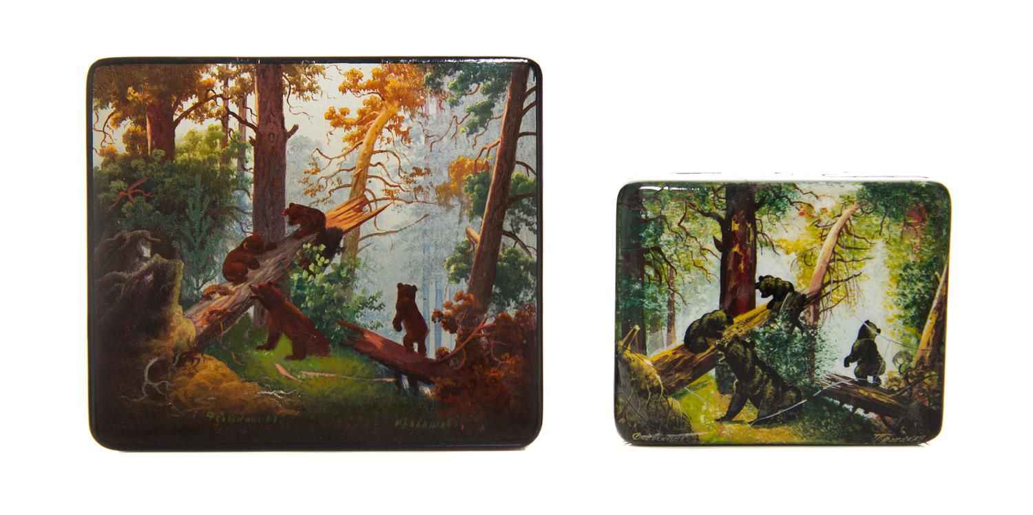 Two Russian Lacquered Boxes, 20th Century, each of rectangular form with hinged lids, both decorated with bears in a forest.
