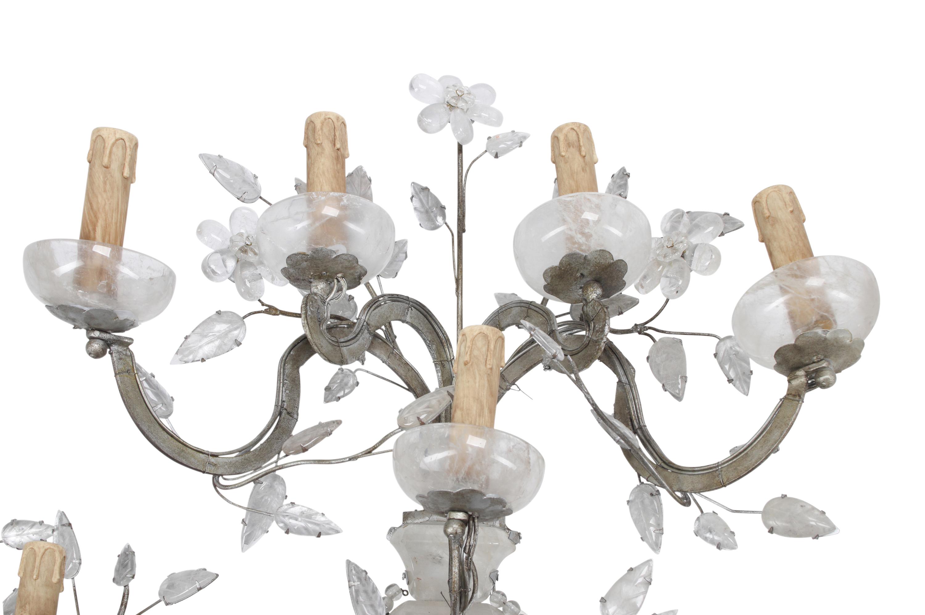 A Set of Four Silvered Metal and Rock Crystal Sconces
