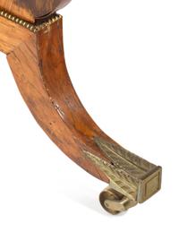 A Regency Brass Mounted Rosewood and Rosewood Grained Writing Table