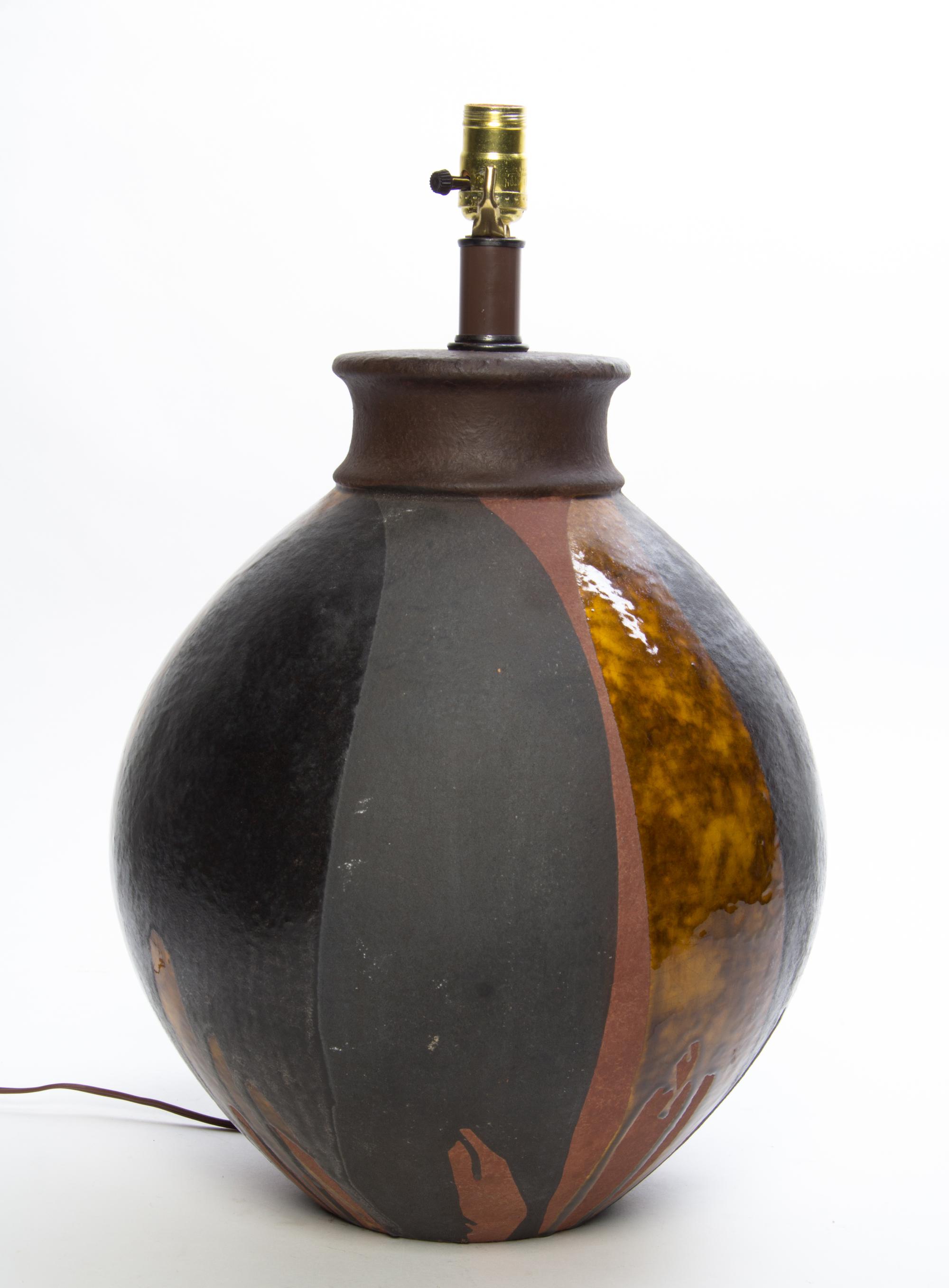 An Italian Ceramic Table Lamp Height 23 inches. — 20TH CENTURY