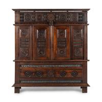 A Breton Carved Walnut Cabinet
