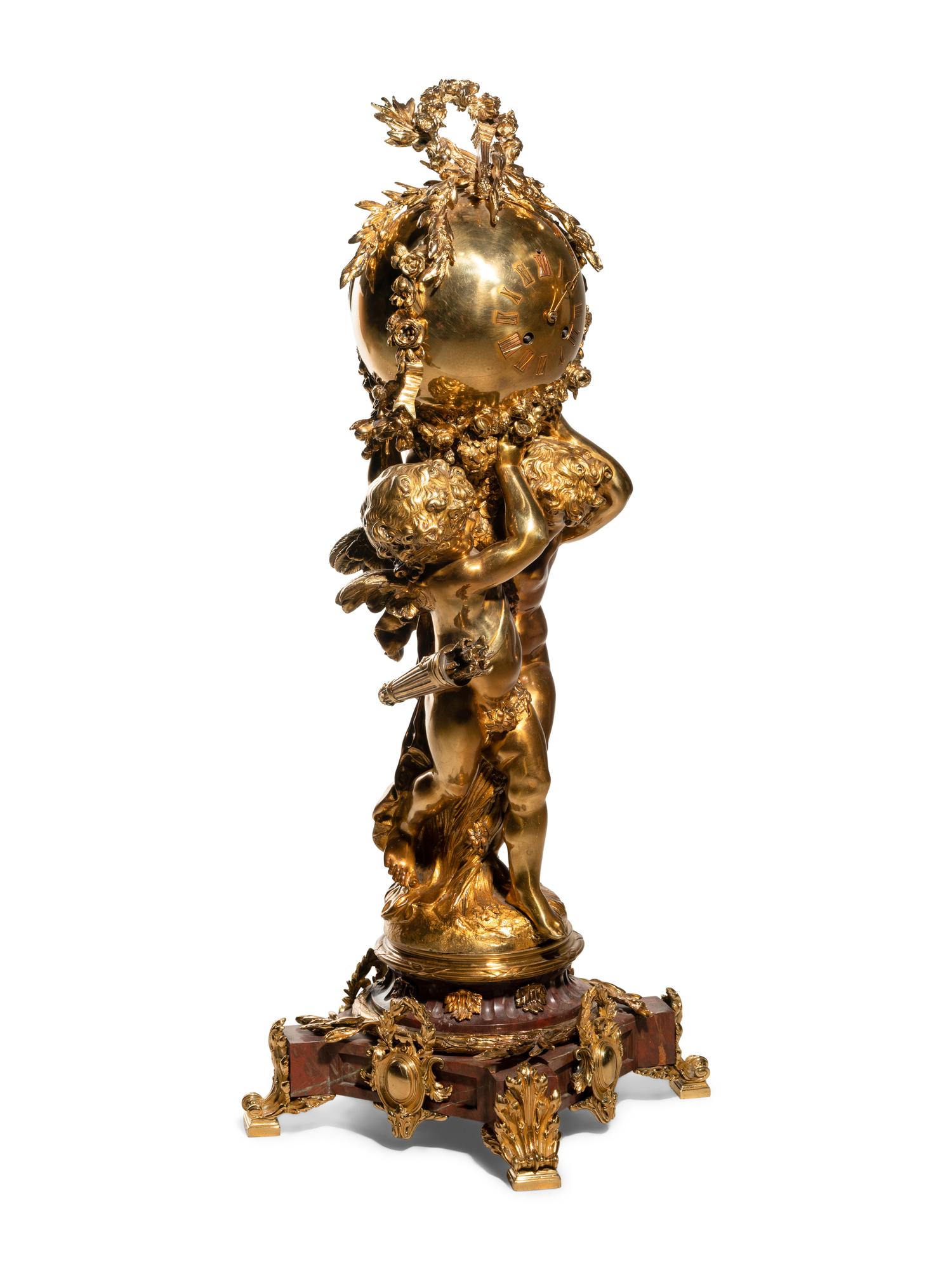 A French Gilt Bronze and Marble Figural Clock