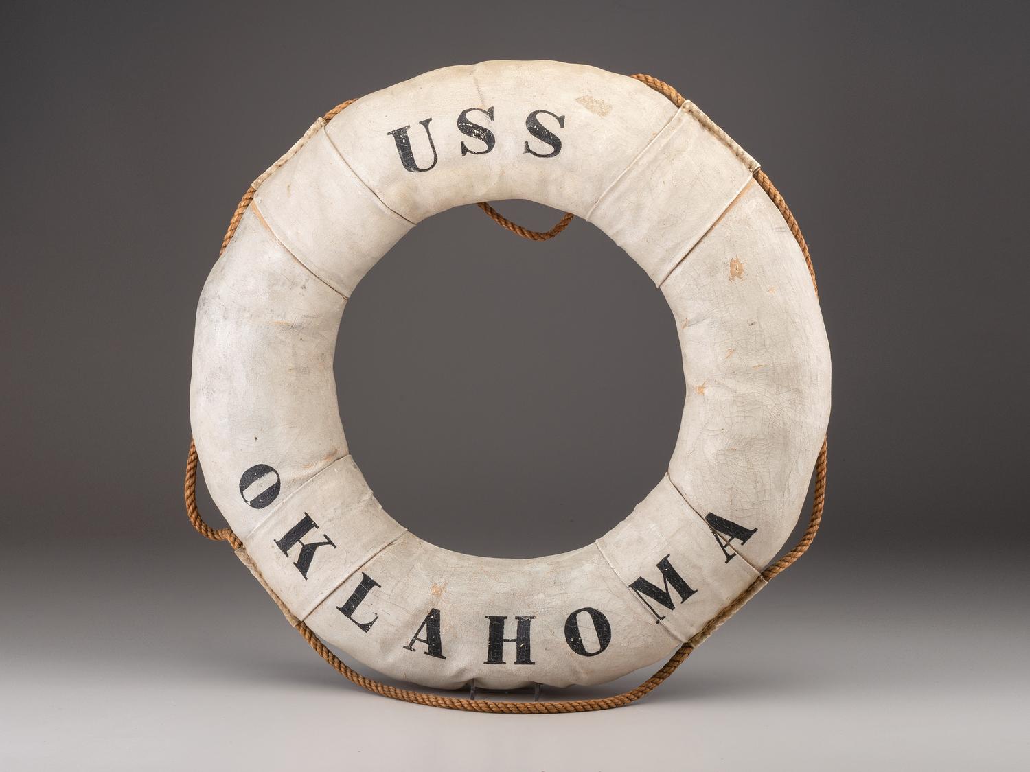 [WORLD WAR II]. USS Oklahoma life ring, ship sunk at Pearl Harbor.