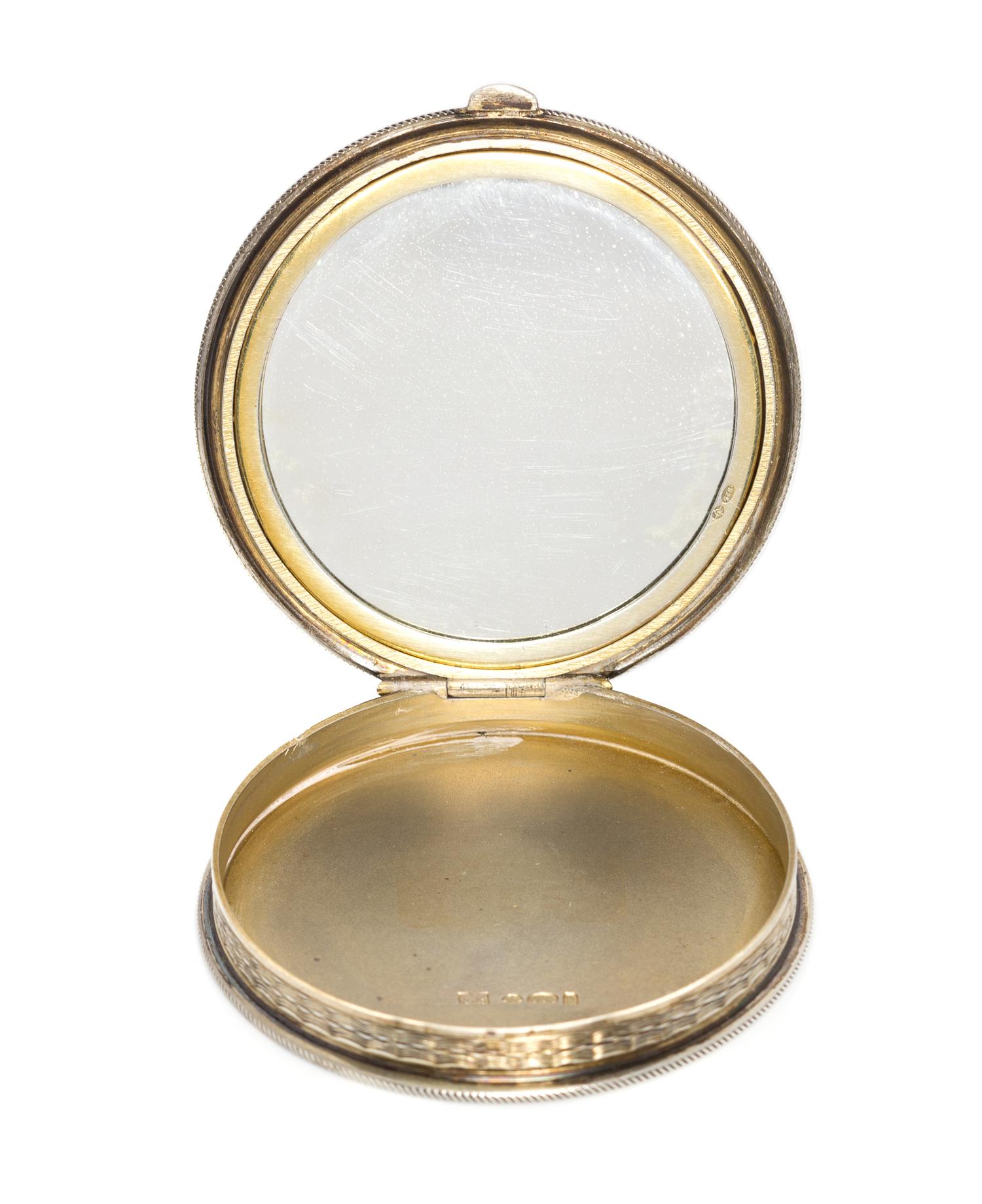 A Continental Silver and Enamel Compact, Import Mark GS, London, 1925, the lid enameled with bamboo shoots, dragonflies and four Chines