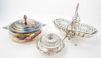 A Group of Silver-plate Articles Height of toast rack 11 inches.