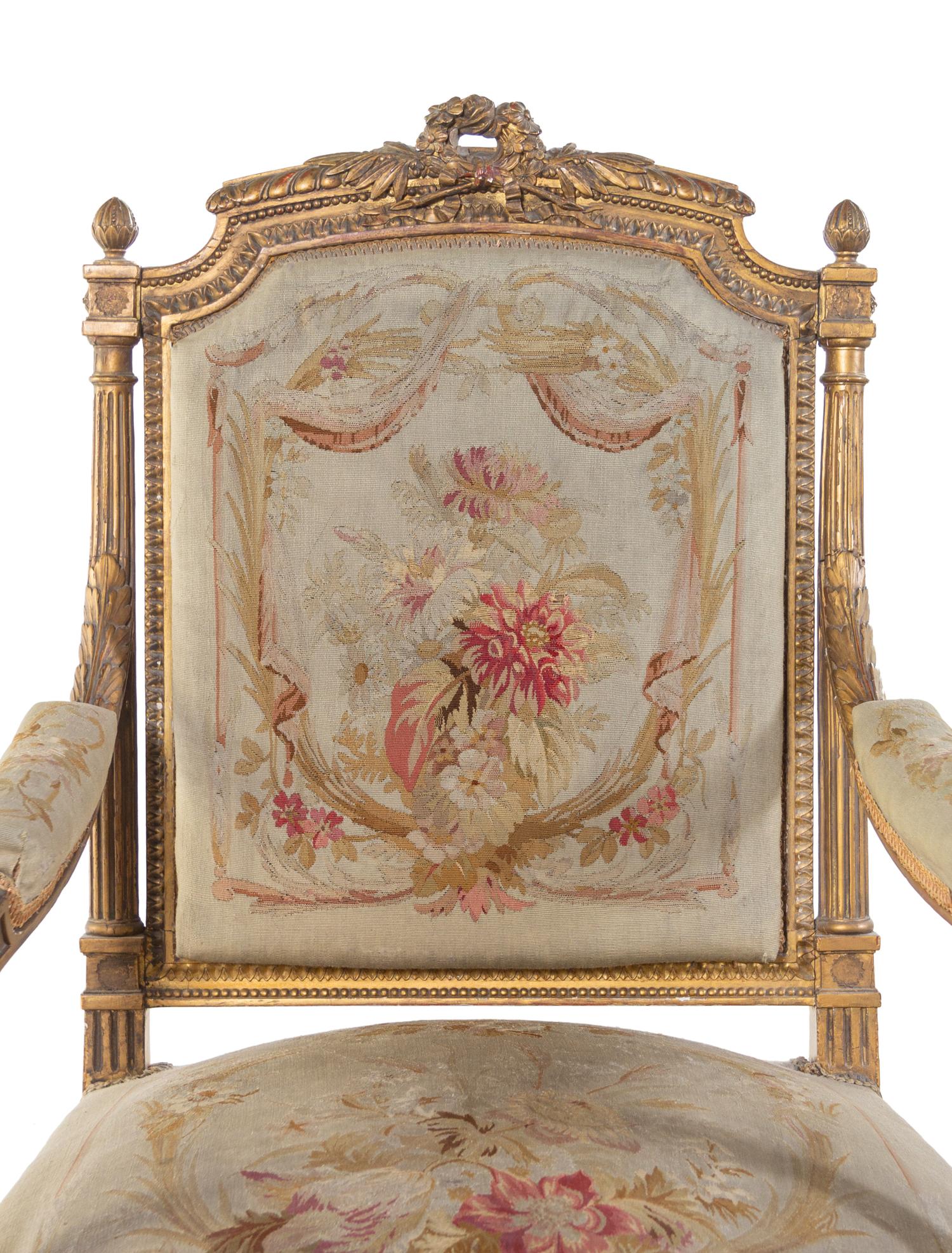 A Louis XVI Style Carved Giltwood Five-Piece Parlor Suite