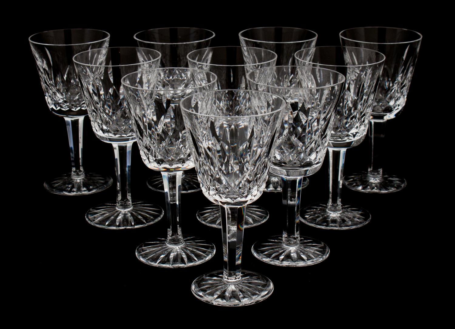 A Set of Ten Waterford Cut Crystal White Wine Glasses Height 5 3/4 inches.