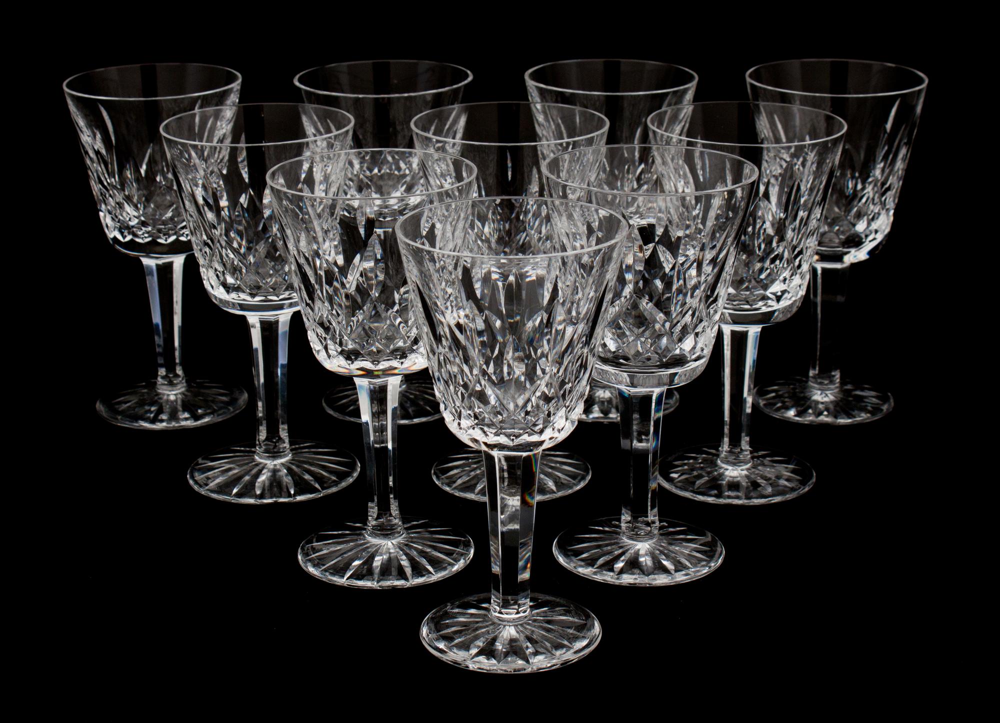 A Set of Ten Waterford Cut Crystal White Wine Glasses Height 5 3/4 inches.