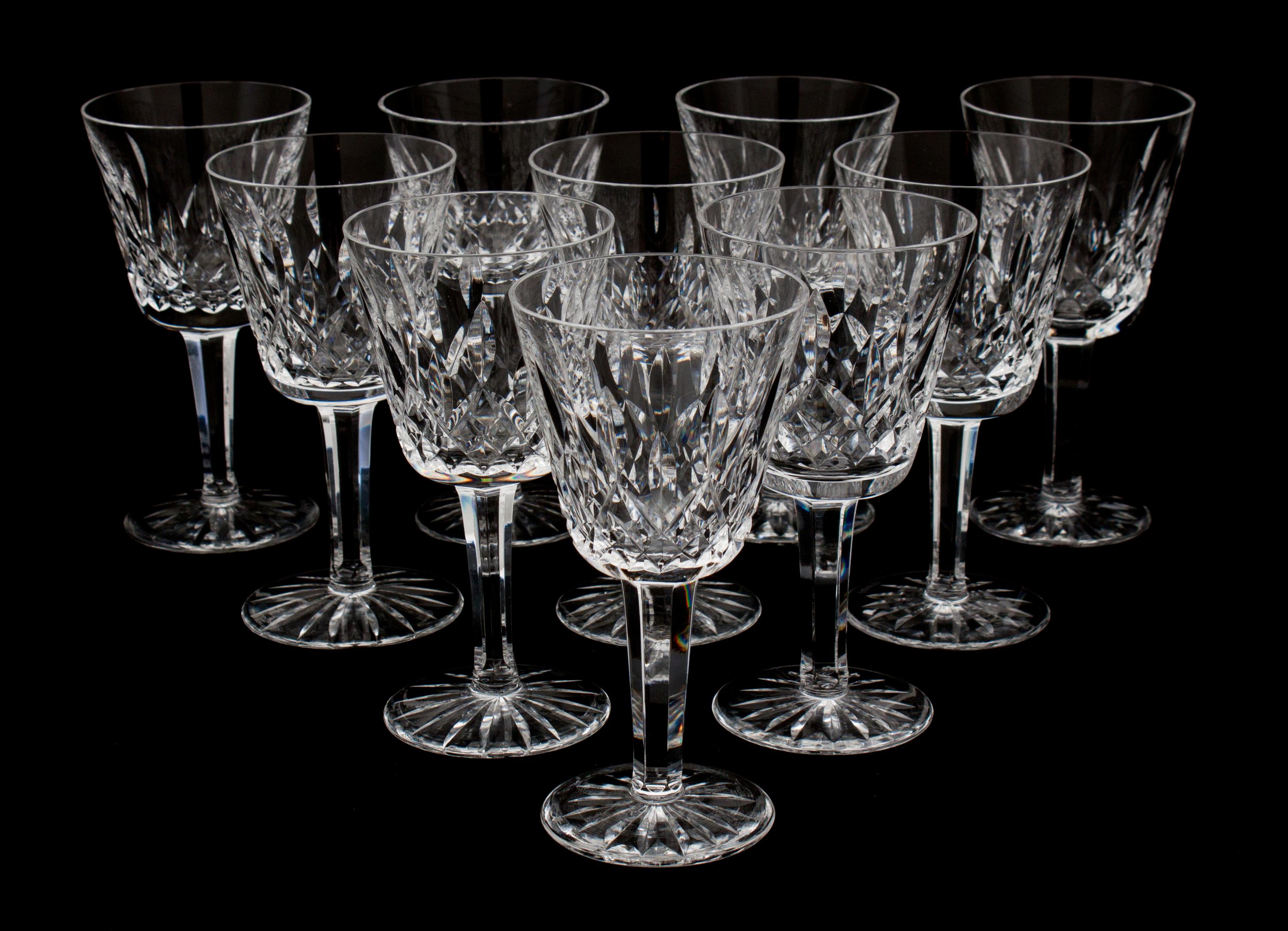 A Set of Ten Waterford Cut Crystal White Wine Glasses Height 5 3/4 inches.