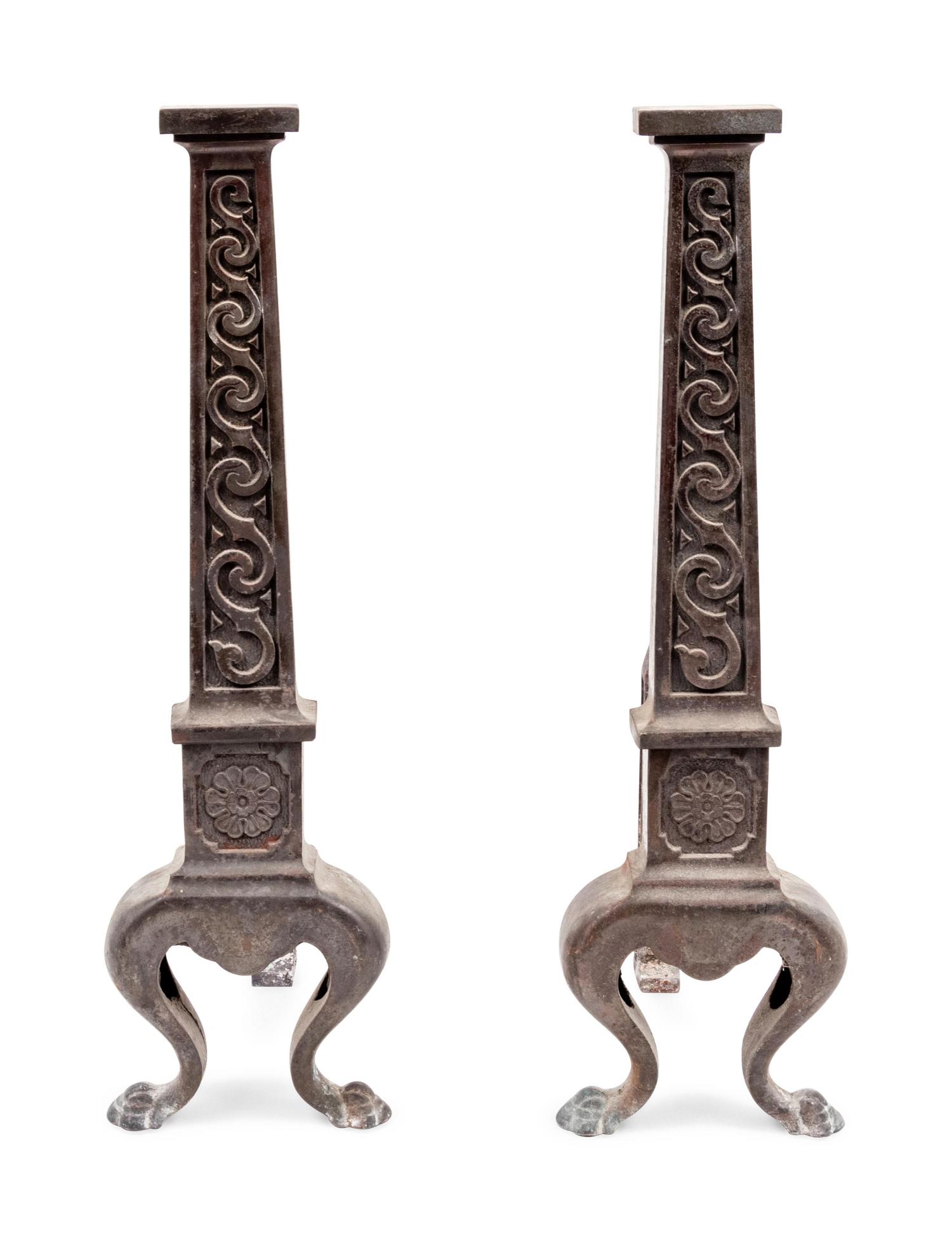 A Pair of English Aesthetic Movement Cast Iron Andirons