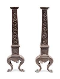 A Pair of English Aesthetic Movement Cast Iron Andirons