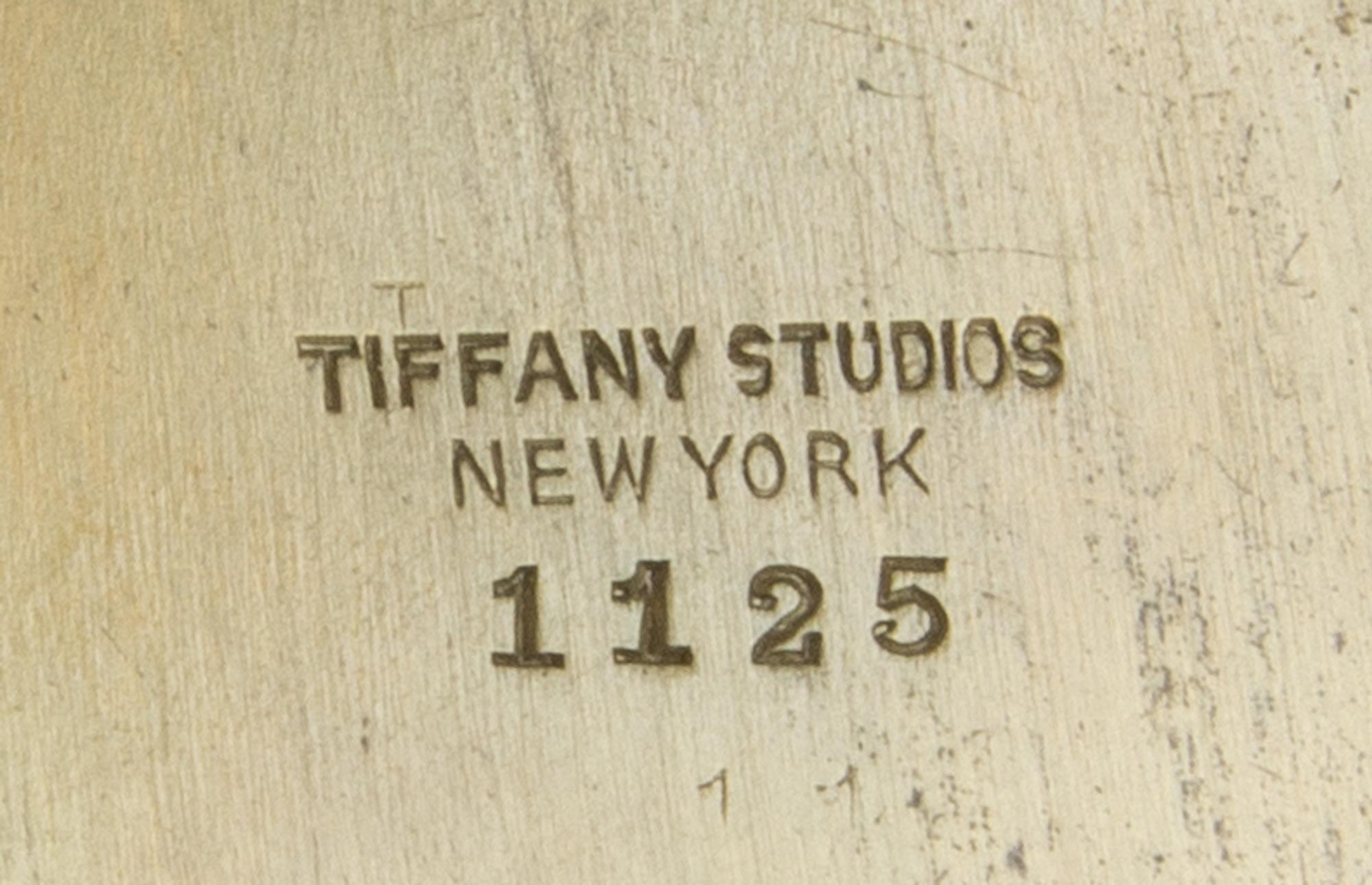 Tiffany Studios, EARLY 20TH CENTURY, a collection of three rare pattern desk articles