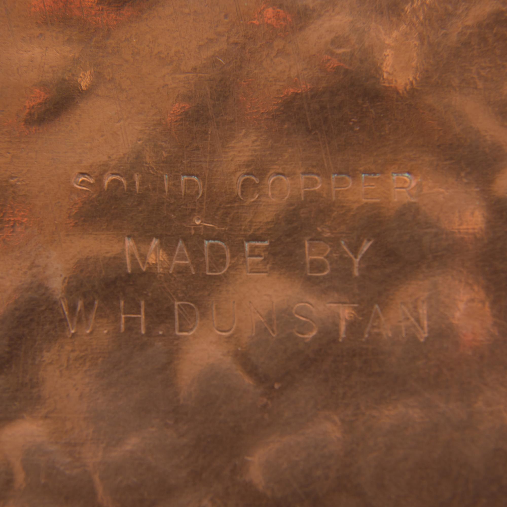 An Arts & Crafts Hammered Copper Plate