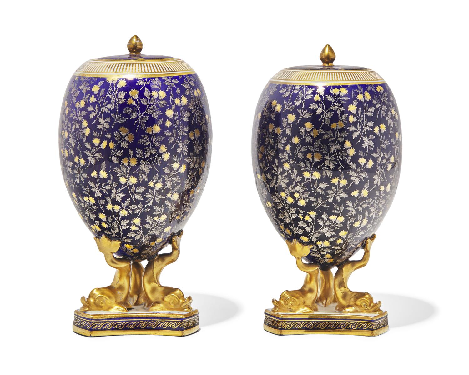 A Pair of Wedgwood Parcel Gilt Porcelain Covered Urns