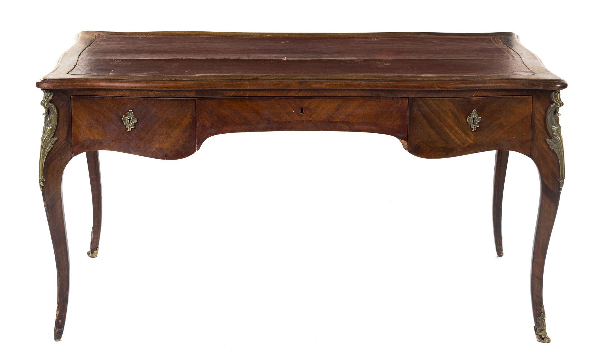 A Louis XV Style Bureau Plat Height 30 1/8 x width 56 1/2 x depth 29 3/8 inches.