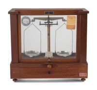 A Central Scientific Co. Scale, an Ingraham Eight-Day Movement Mantle Clock and Framed Salesmen Samples of Blue Grass Axes