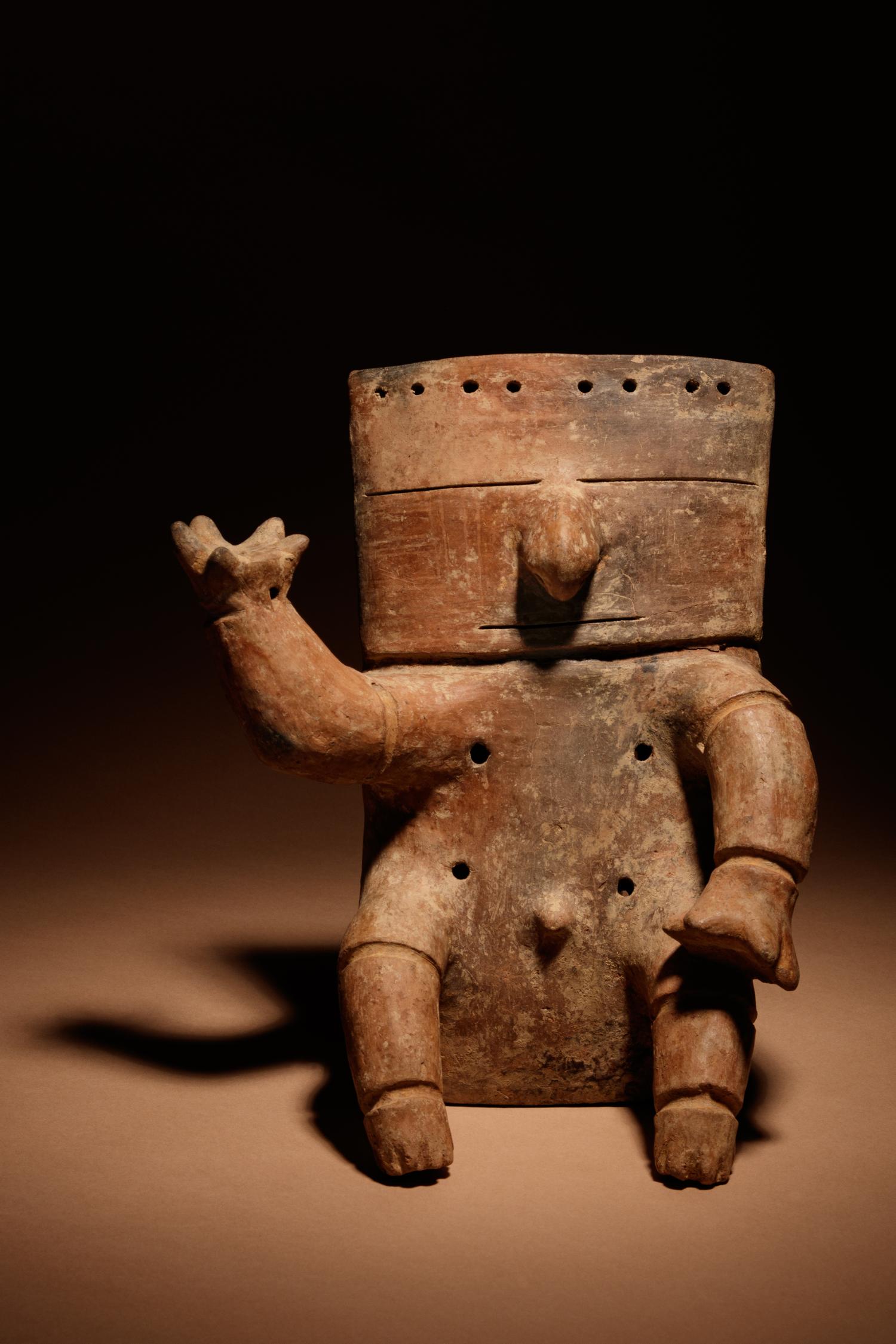 A Quimbaya Terracotta Seated Figure