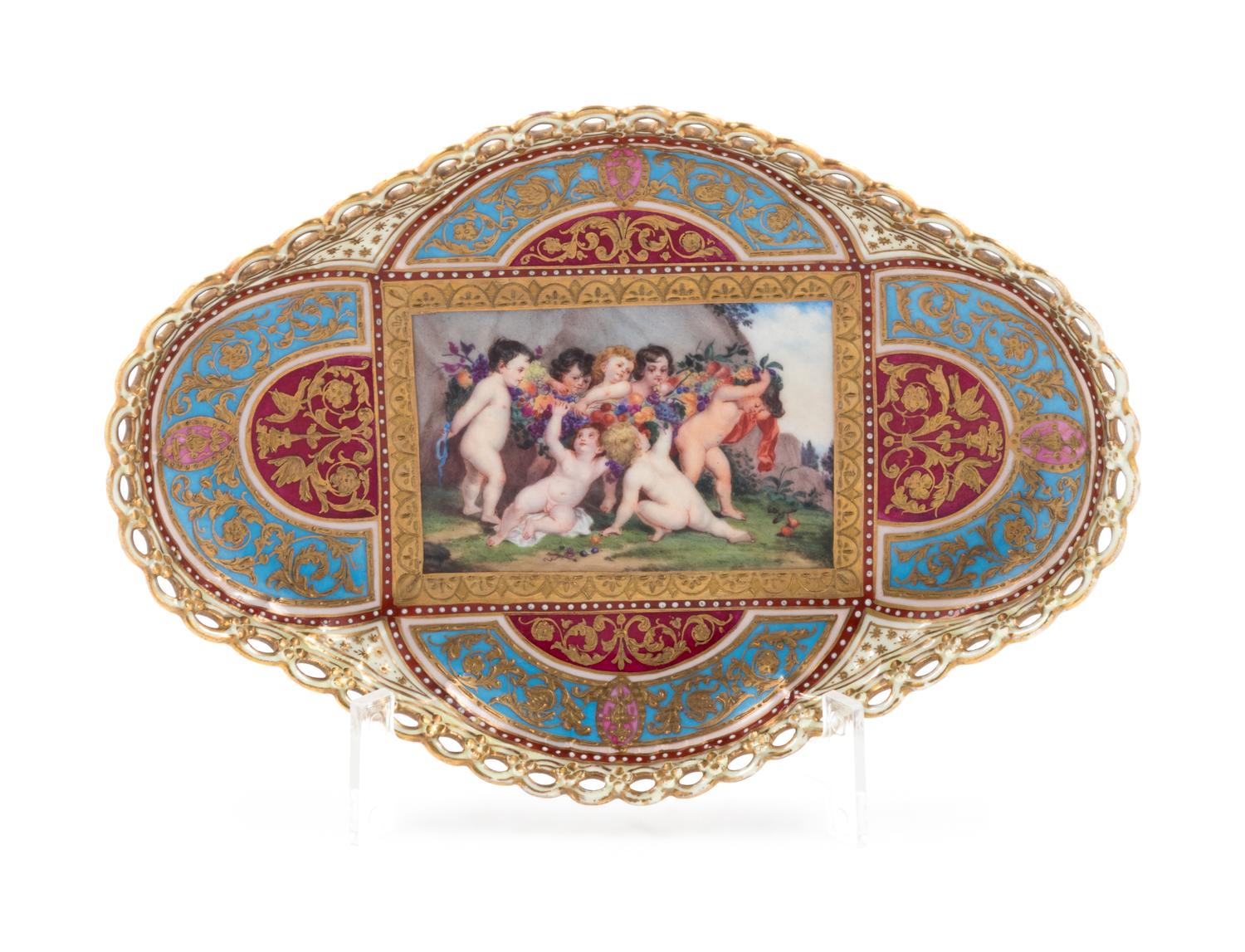 A Berlin (K.P.M.) Painted and Parcel Gilt Porcelain Quatrefoil Tray