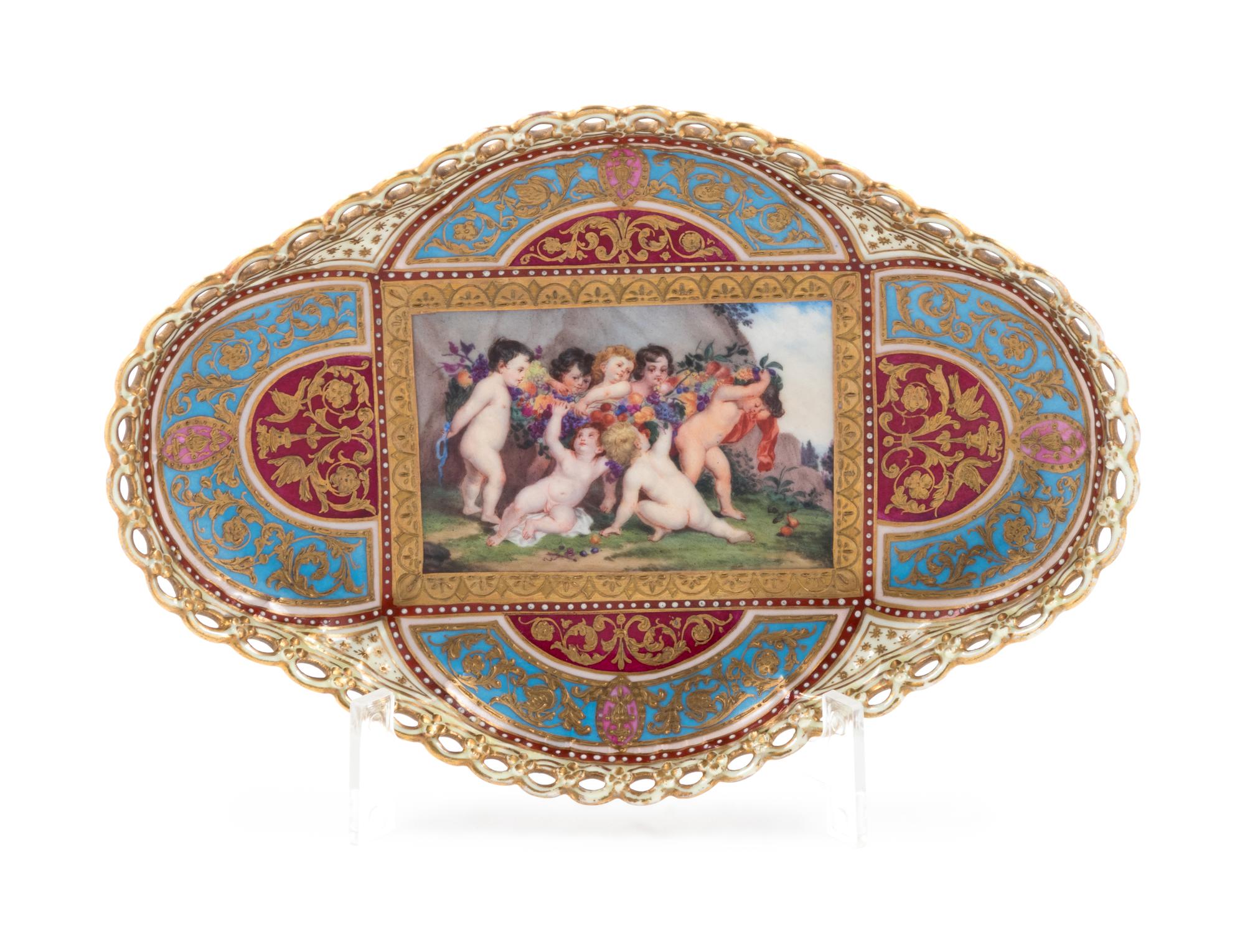 A Berlin (K.P.M.) Painted and Parcel Gilt Porcelain Quatrefoil Tray